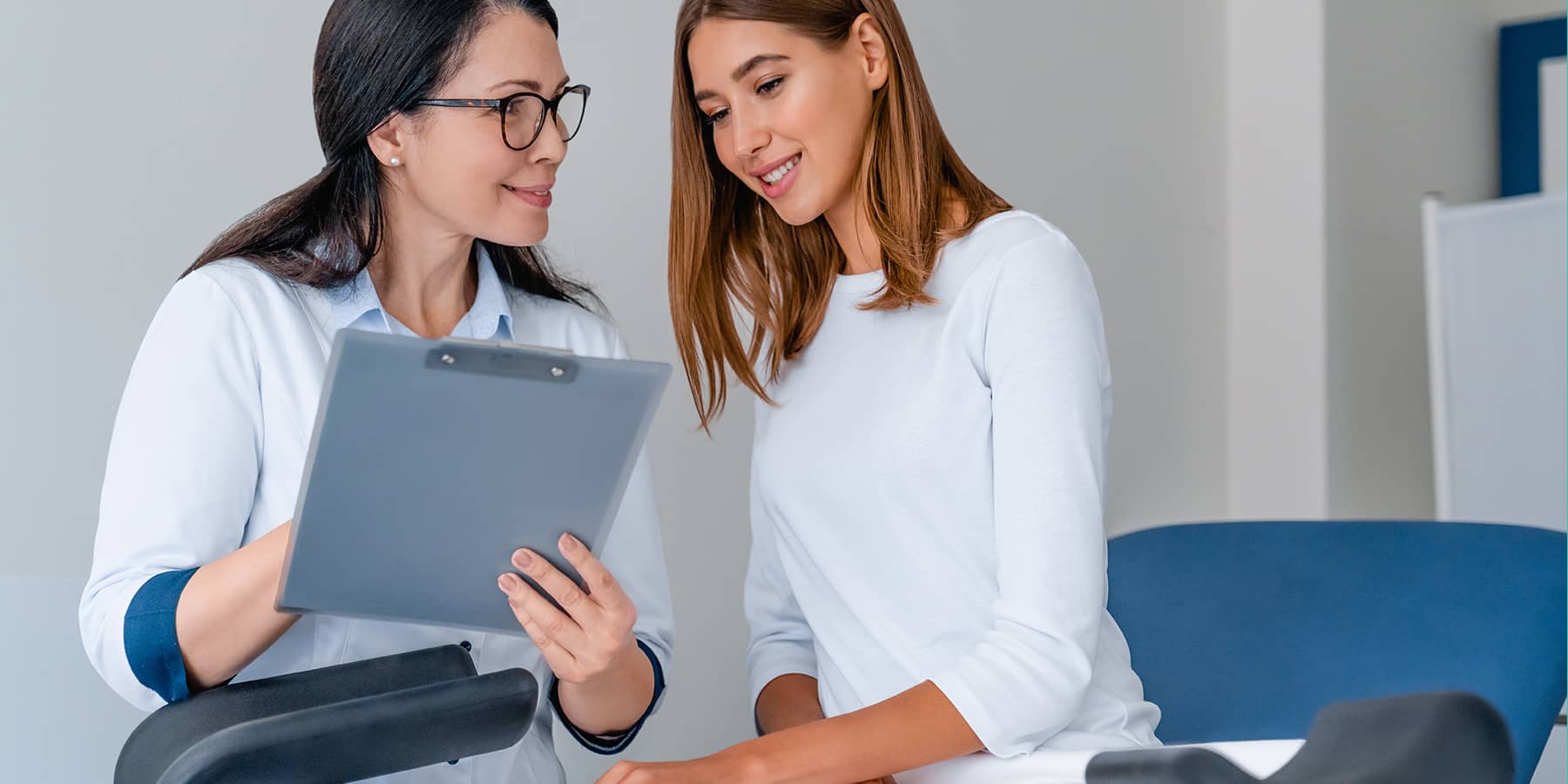 Healthcare provider and patient discussing whether IUD affects hormone levels