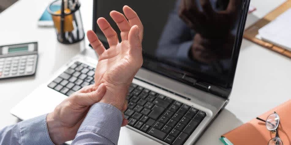 Man with wrist inflammation wondering how to prevent arthritis