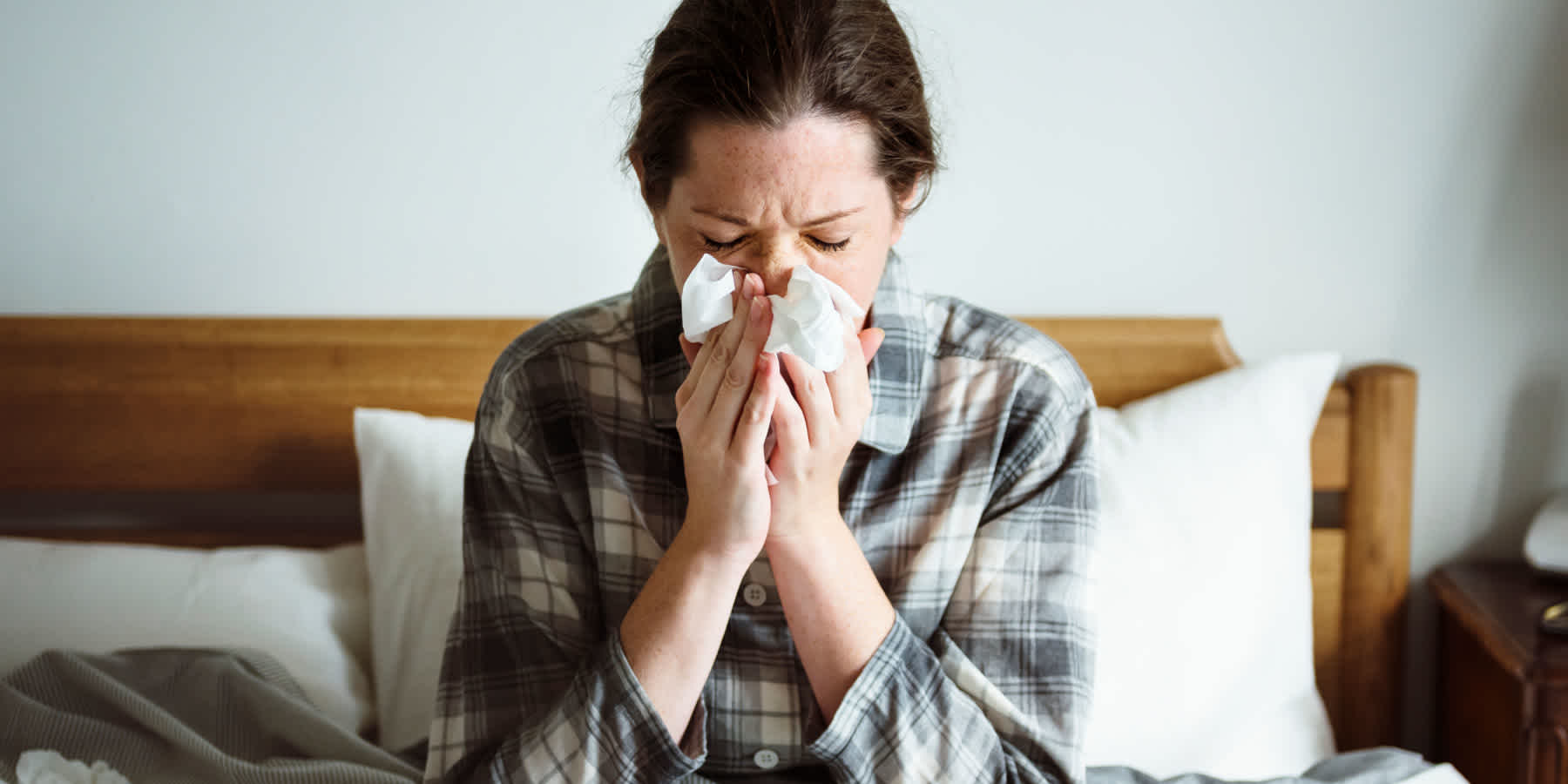 Woman with flu symptoms wondering about taking Tamiflu without a positive flu test