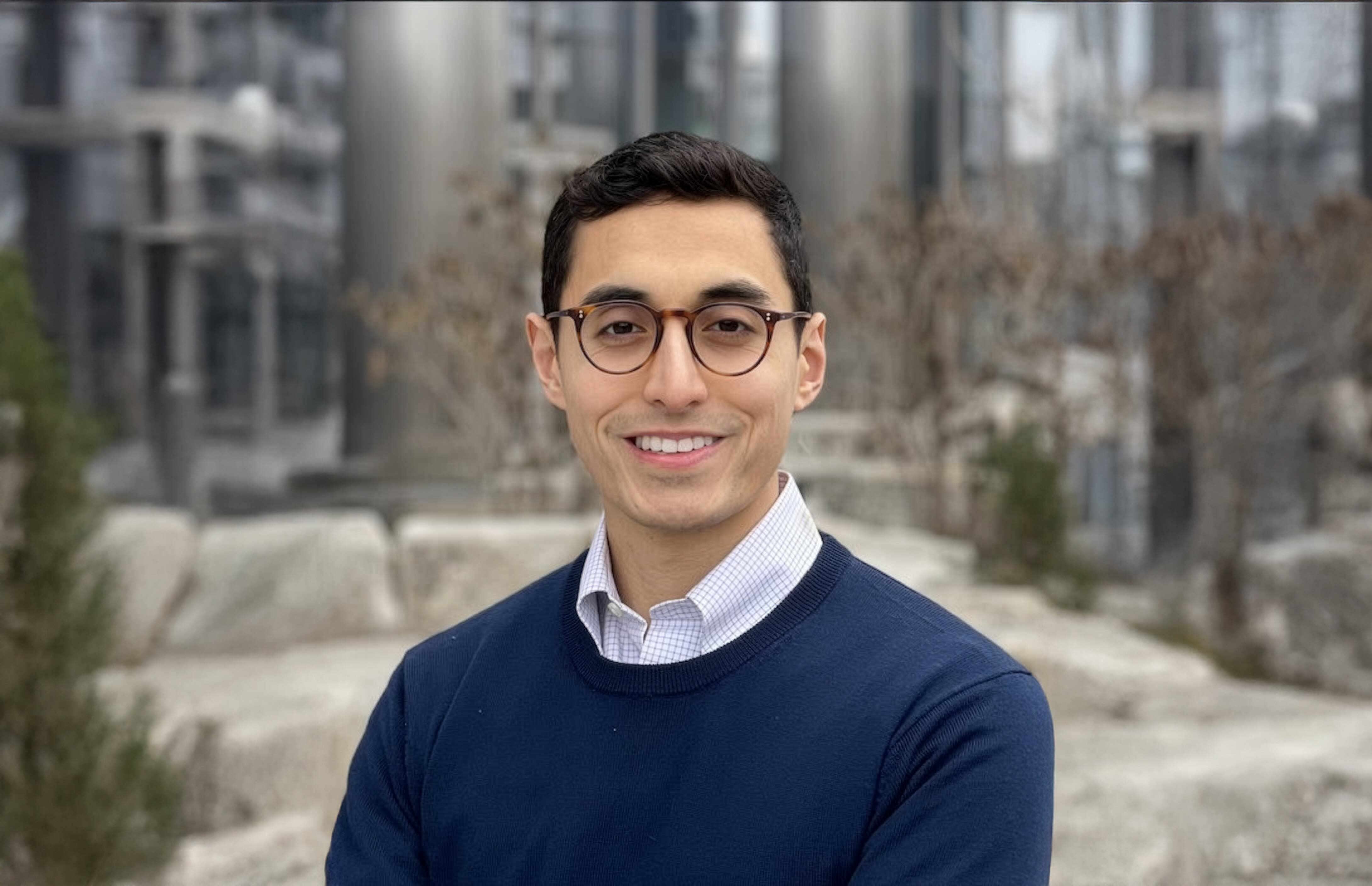Gabe Gaviola's headshot on an open space background