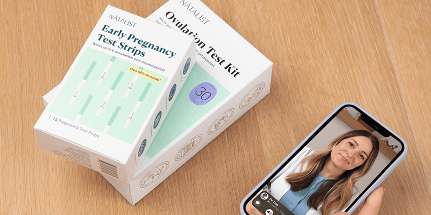 Woman with mobile phone talking with healthcare provider about reproductive health with Natalist Ovulation Test Kit and Early Pregnancy Test Strips on the table