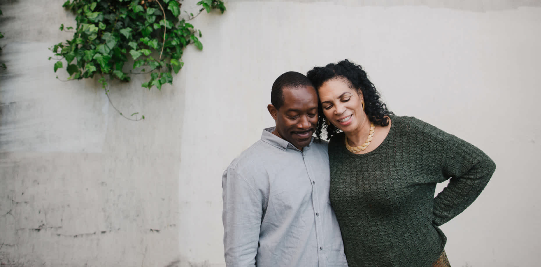 Couple smiling and hugging after using Truvada® effectively in preventing HIV