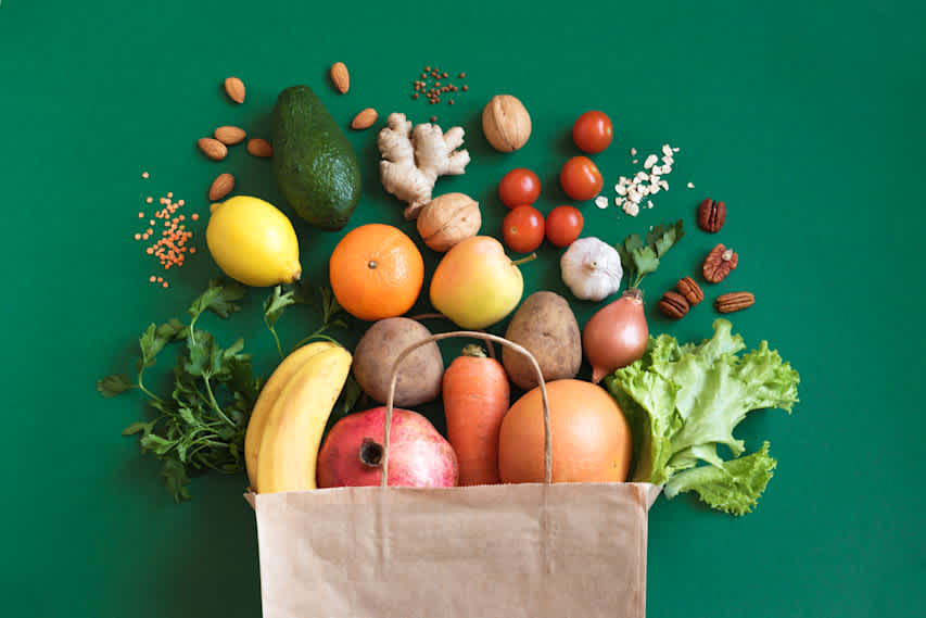 produce coming out of grocery bag
