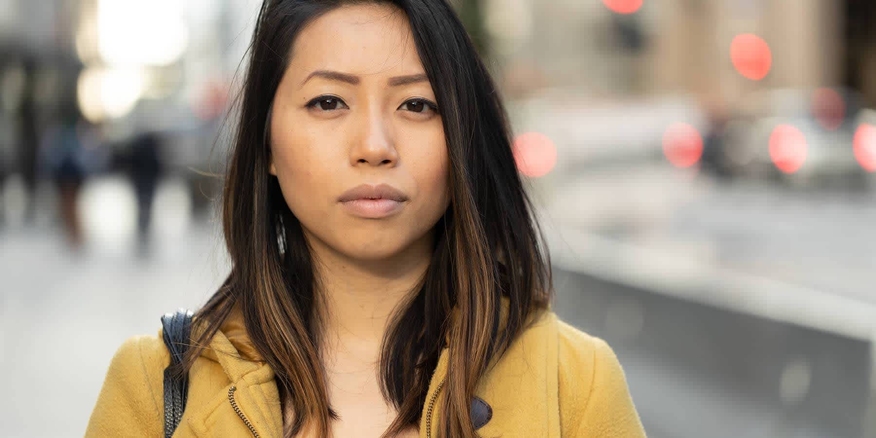 Woman walking down city street hearing about 5 eye opening women's health stats