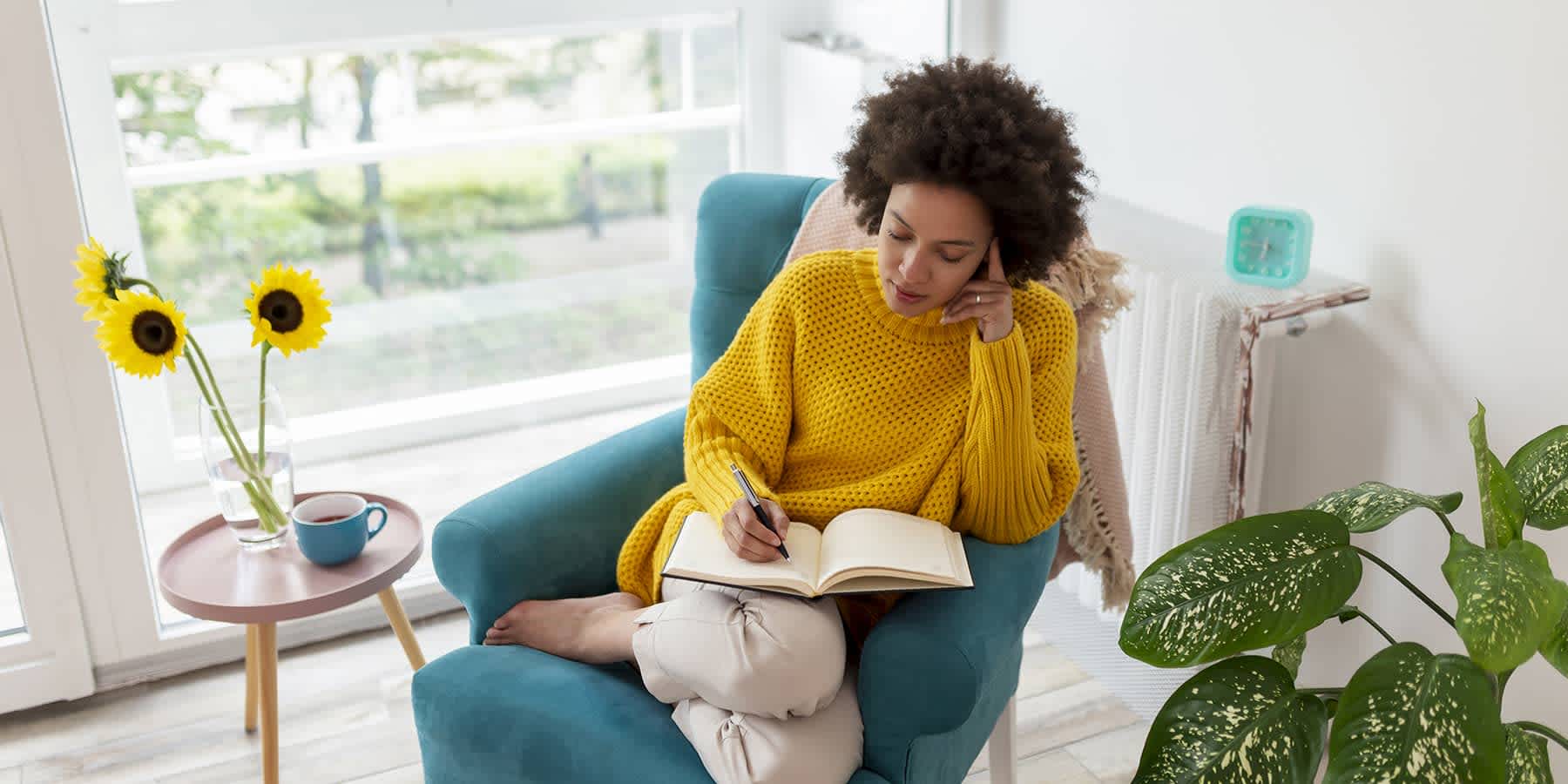 Woman reading over her healthcare checklist for 2024