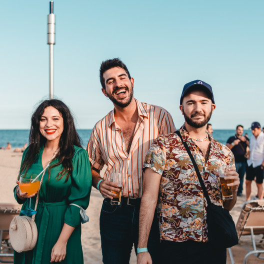 Fourthline members at beach event laughing