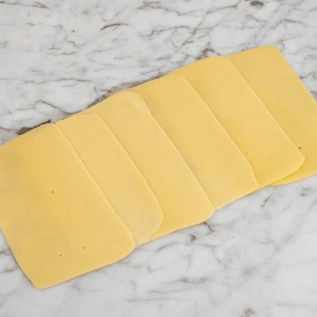 81944 WFMex Raw QUESO MANCHEGO REBANADO Queso