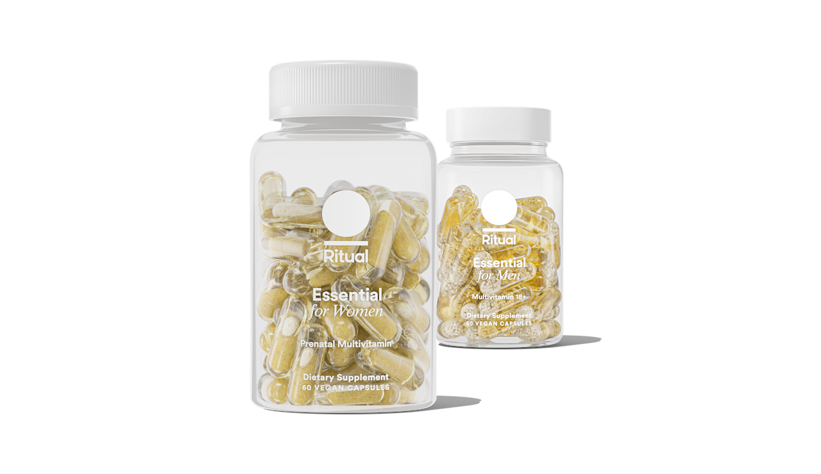 Bottles of Essential Prenatal and Essential for Men 18+ on a transparent background.