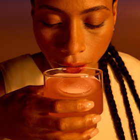 Person drinks Ritual Magnesium+ beverage.