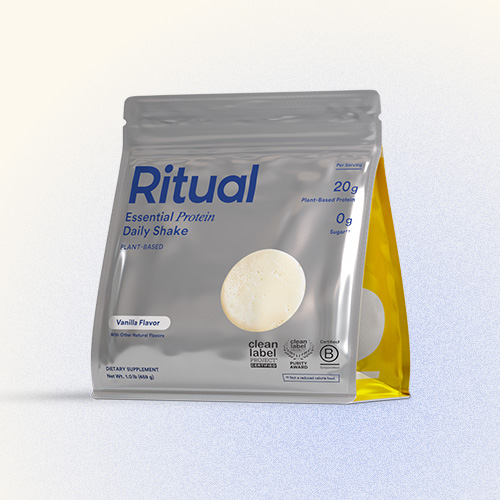 Package of Essential Protein Daily Shake on a gradient background.