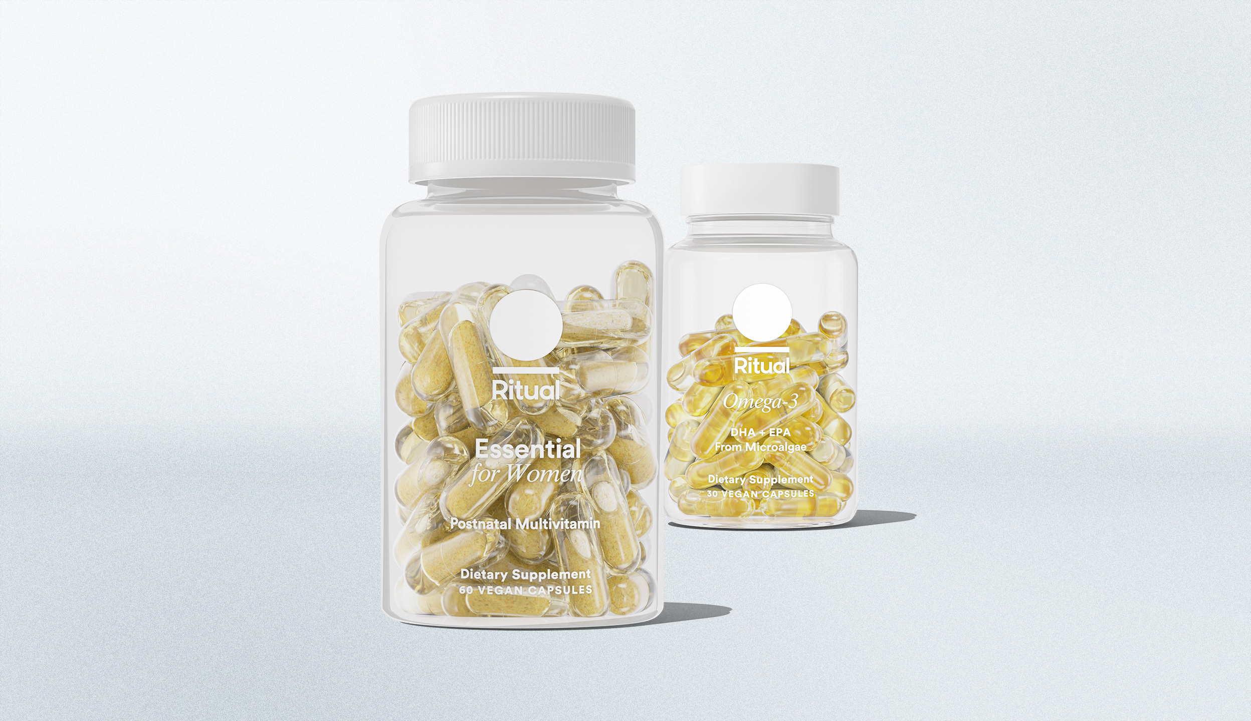 Bottle for Essential Postnatal in foreground and bottle for Omega-3 in background