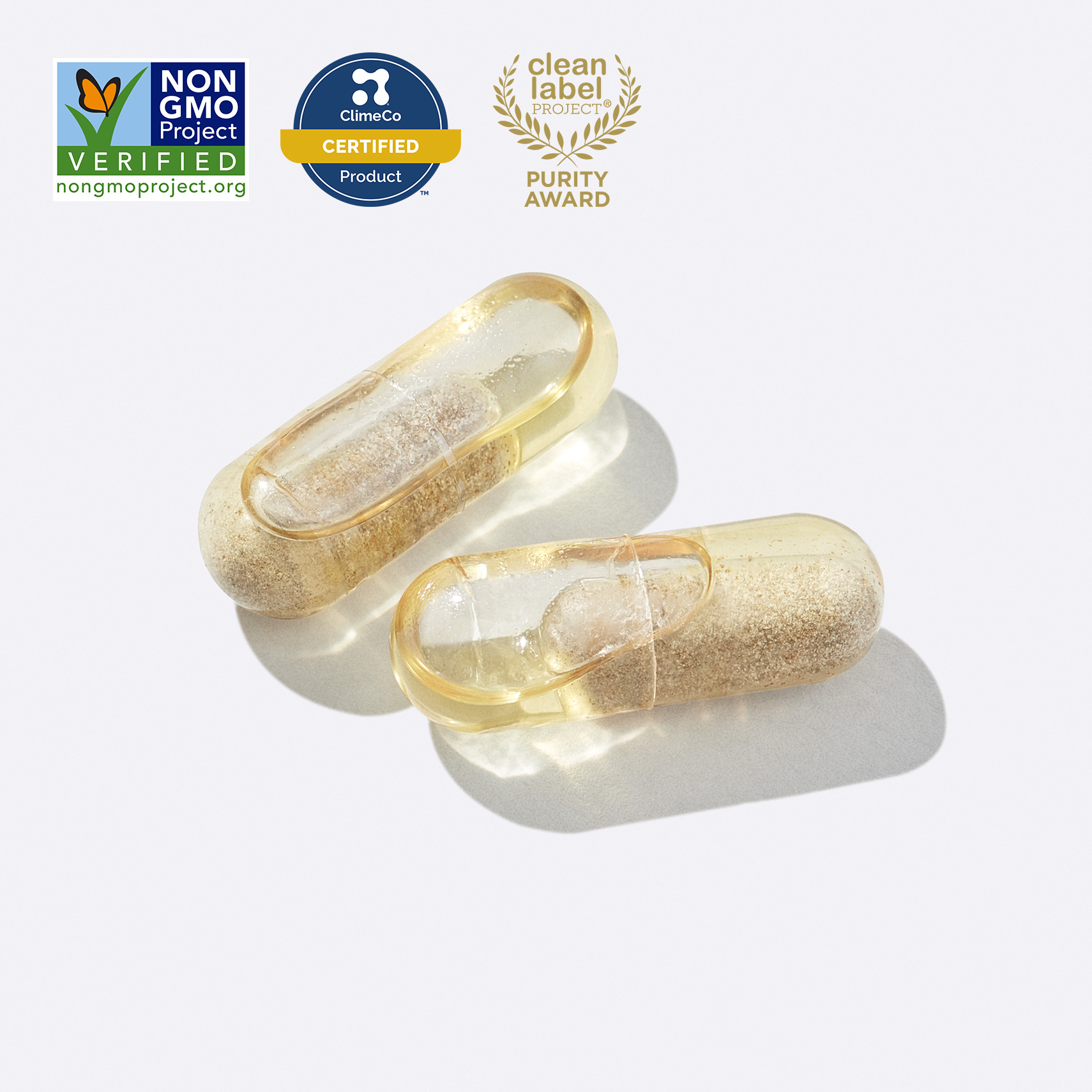 Clear capsules with Non GMO Verified, ClimeCo Certified, and Clean Label Project Purity Award Badges. 