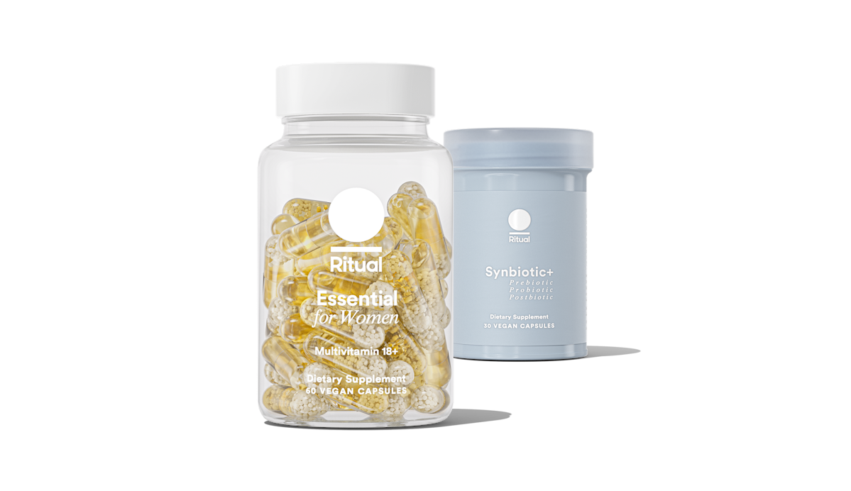 Bottle of Essential for Women 18+ and bottle of Synbiotic+ on a transparent background.