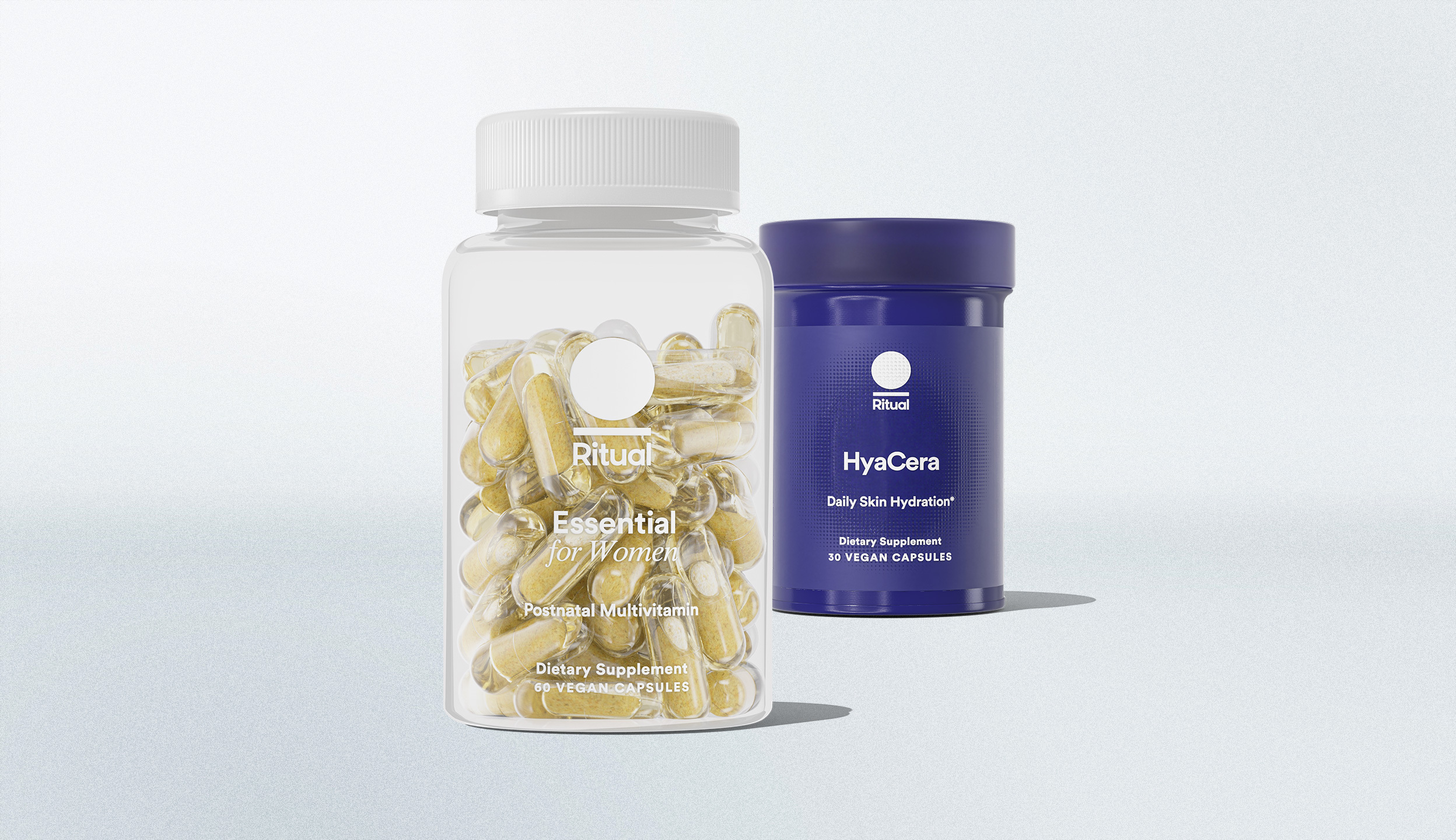 Bottle of Essential Postnatal in foreground and bottle of HyaCera in background