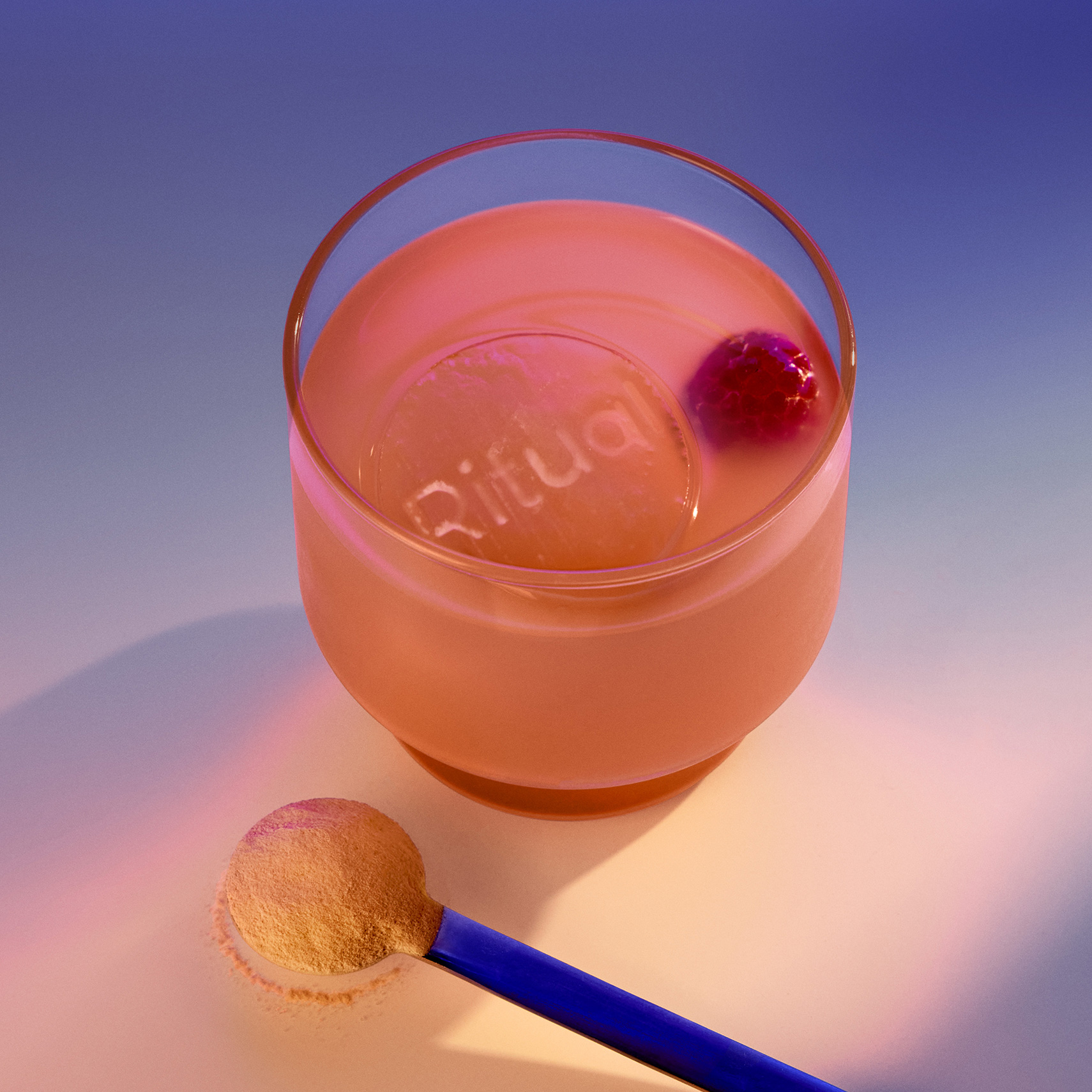 Ritual Magnesium+ drink with ice and raspberry.