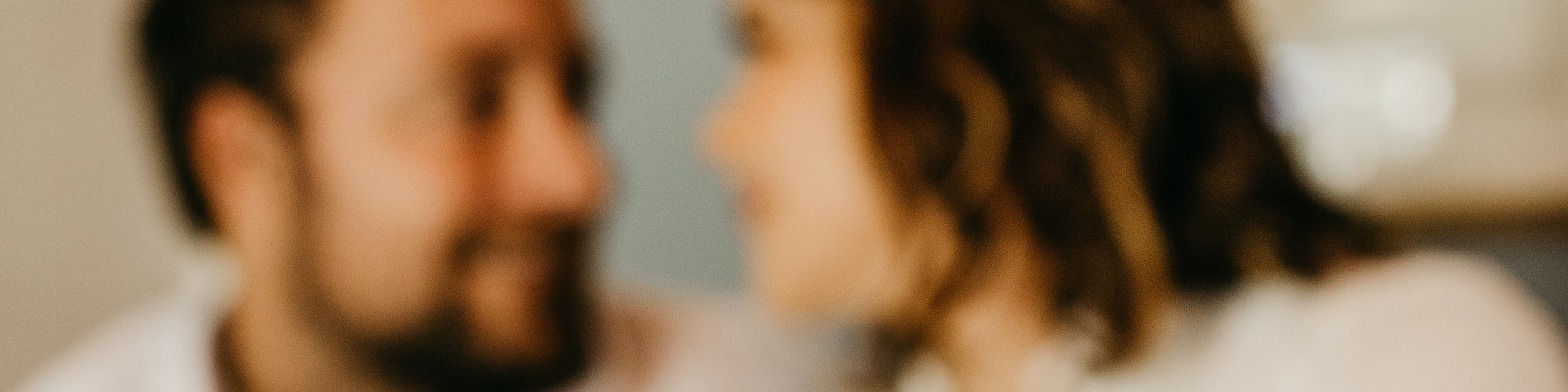 A blurred out female and male couple.