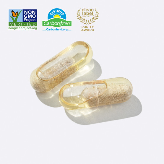 Clear capsules with Non GMO Verified, Certified Carbon Free, and Clean Label Project Purity Award Badges. 