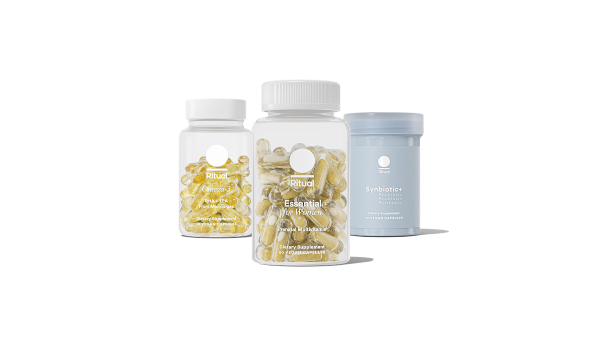 Bottles of Essential Prenatal, Omega-3 DHA & EPA, and Synbiotic+ on a transparent background.