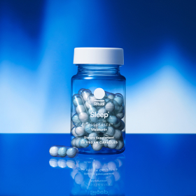 Sleep BioSeries™ bottle with pill sitting alongside.