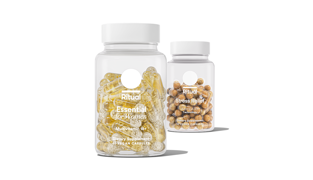 Bottles of Essential for Women 18+ and Stress Relief on a transparent background.