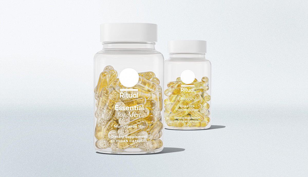 Bottle for Men's Multivitamin in foreground and bottle for Omega-3 in background