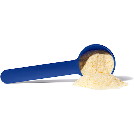 Blue scoop with drink mix powder slightly spilling out.