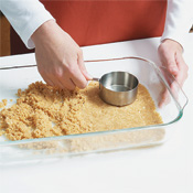 Press crust into a baking dish with a measuring cup. Bake until just until set. 