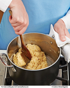 To evaporate excess liquid, once dough forms around the spoon, stir it over low until a film forms on the pan.