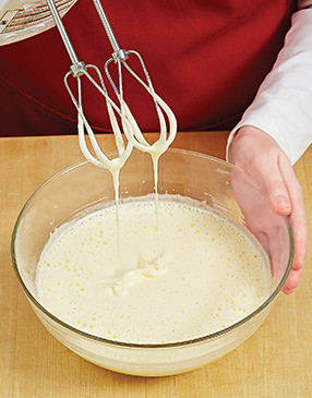 For a light-textured cake, incorporate air into the batter by beating the eggs and sugar until thick and pale.