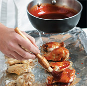 Broiling first, then basting the wings ensures even cooking and keeps the glaze from burning.