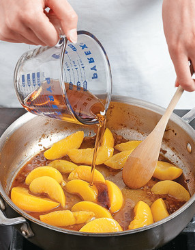 Simmer peaches and maple syrup with the bourbon and shallots to create a glaze for the pork chops.