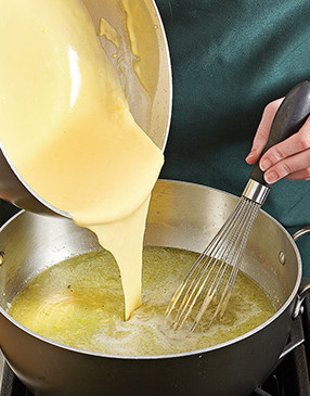 To keep the soup from clumping or curdling, add the cheese mixture once the vegetables are blended.