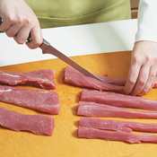 Cut each piece in half lengthwise to make 12 strips. Toss pork strips in hoisin marinade. 