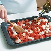 Toss the tomatoes, onion, garlic, and seasonings in oil and roast until tomatoes are soft. Sauce can be made ahead.