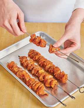 To ensure the chicken cooks quickly and evenly, don’t crowd the skewers too tightly.