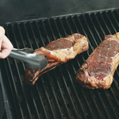 After 2 1/2 minutes, rotate steaks so narrow ends point toward 2 o'clock. Cover, grill 2 1/2 minutes, then flip. Repeat. 