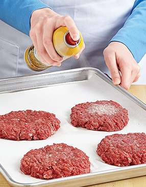 To avoid sticking to the grill, coat burgers with nonstick spray.