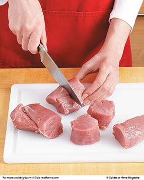 For perfectly sized medallions, slice off the ends of the tenderloin, then cut four medallions from the center.