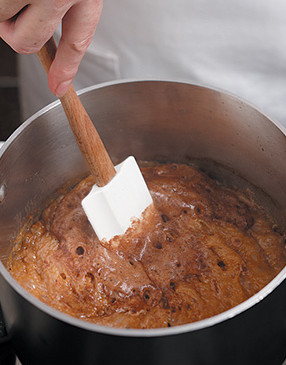 Because the baking soda will cause the sugar to foam up, be sure to use a long-handled, heatproof spatula.