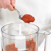 Pulse ingredients for romesco sauce until they're well blended. Heat the sauce on the stove top to thicken.