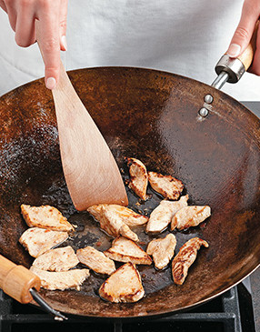 Stir-fry the chicken in two batches, otherwise it will crowd the wok and not brown as nicely.