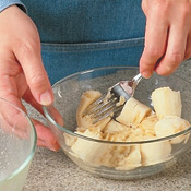 Mash the bananas with a fork or pastry blender, then combine with egg mixture.