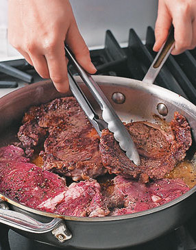For the best browning, cook steaks in a heavy-bottomed sauté pan and don't move them much. 
