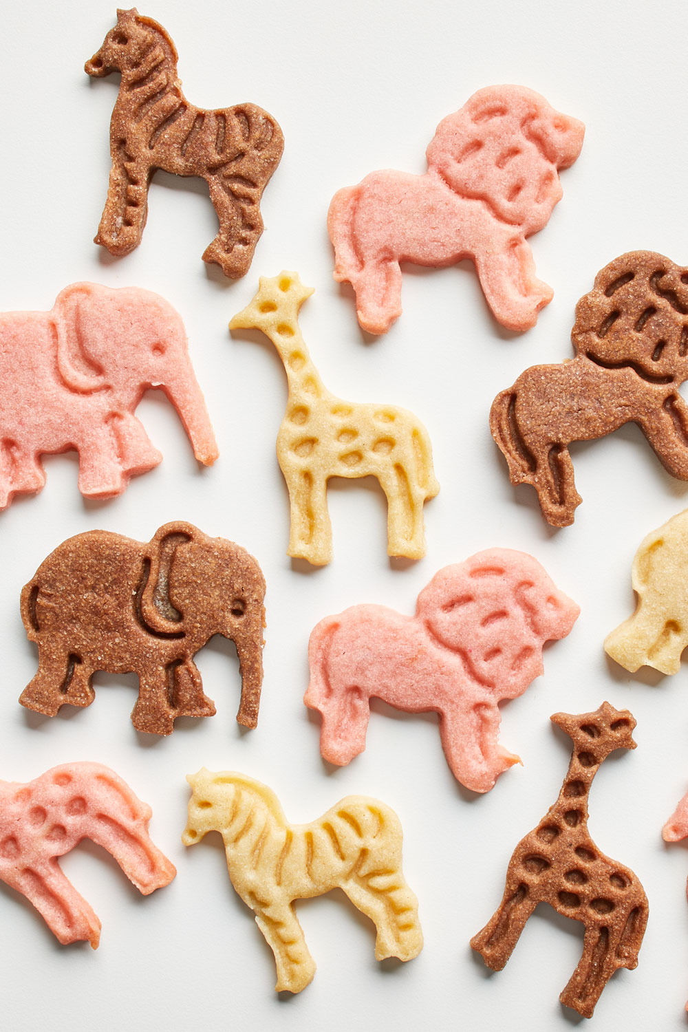 Free: Animal shaped cookies with kitchen utensils on table 