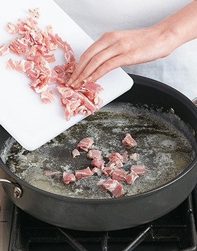 Pancetta is salt-cured pork belly often referred to as Italian bacon. Cook it in butter until it’s crisp.