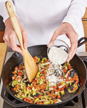 Once the vegetables are coated with flour, cook them for 1 minute to get rid of the flour’s raw taste.