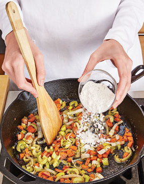 Once the vegetables are coated with flour, cook them for 1 minute to get rid of the flour’s raw taste.