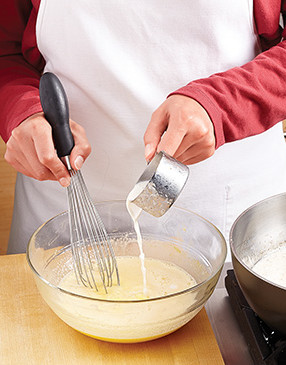 To prevent the eggs from curdling, temper the yolk mixture, drizzling in the hot cream while whisking.