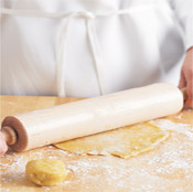 After mixing the pastry dough, divide it into two portions. Carefully roll each portion into a disk.