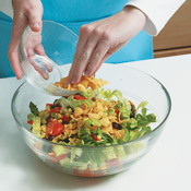 Corn chips add crunchy flavor to this salad, but you can substitute tortilla chips. 